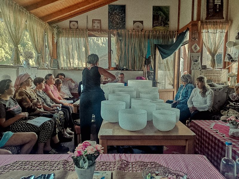 Quartz crucibles laid out in a room of the house, the audience listening